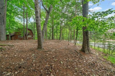 A Tranquil Woodland Escape in Lake Arrowhead awaits the lucky on The Highlands Course at Lake Arrowhead in Georgia - for sale on GolfHomes.com, golf home, golf lot