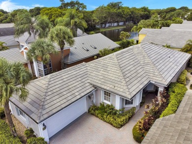 Located in Oxford Estates in posh Boca Raton, this small gated on Boca Lago Golf and Country Club in Florida - for sale on GolfHomes.com, golf home, golf lot
