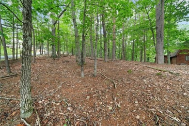 A Tranquil Woodland Escape in Lake Arrowhead awaits the lucky on The Highlands Course at Lake Arrowhead in Georgia - for sale on GolfHomes.com, golf home, golf lot