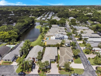 Located in Oxford Estates in posh Boca Raton, this small gated on Boca Lago Golf and Country Club in Florida - for sale on GolfHomes.com, golf home, golf lot