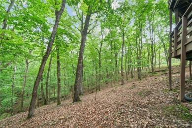 A Tranquil Woodland Escape in Lake Arrowhead awaits the lucky on The Highlands Course at Lake Arrowhead in Georgia - for sale on GolfHomes.com, golf home, golf lot