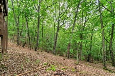 A Tranquil Woodland Escape in Lake Arrowhead awaits the lucky on The Highlands Course at Lake Arrowhead in Georgia - for sale on GolfHomes.com, golf home, golf lot