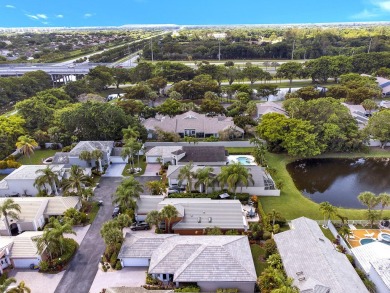 Located in Oxford Estates in posh Boca Raton, this small gated on Boca Lago Golf and Country Club in Florida - for sale on GolfHomes.com, golf home, golf lot