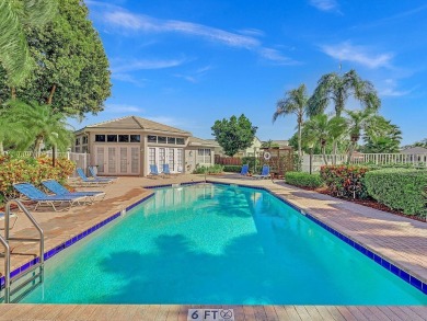 Located in Oxford Estates in posh Boca Raton, this small gated on Boca Lago Golf and Country Club in Florida - for sale on GolfHomes.com, golf home, golf lot
