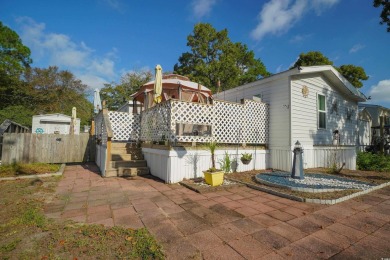 Discover tranquility in this fully furnished 3-bedroom, 2-bath on Prestwick Country Club in South Carolina - for sale on GolfHomes.com, golf home, golf lot