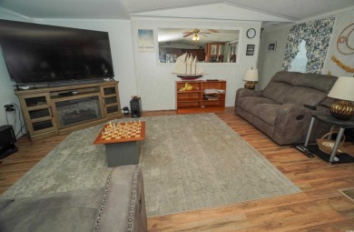 Discover tranquility in this fully furnished 3-bedroom, 2-bath on Prestwick Country Club in South Carolina - for sale on GolfHomes.com, golf home, golf lot
