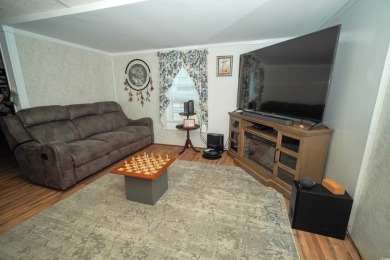 Discover tranquility in this fully furnished 3-bedroom, 2-bath on Prestwick Country Club in South Carolina - for sale on GolfHomes.com, golf home, golf lot