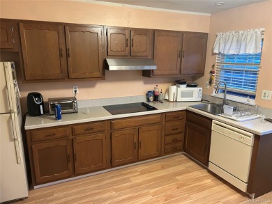 Welcome to 65 Enfield Court Unit A, a beautifully maintained on Leisure Village Golf Course in New York - for sale on GolfHomes.com, golf home, golf lot