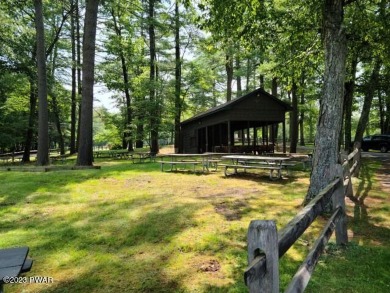 If you are looking for a beautiful and quiet setting surrounded on Woodloch Springs Country Club in Pennsylvania - for sale on GolfHomes.com, golf home, golf lot