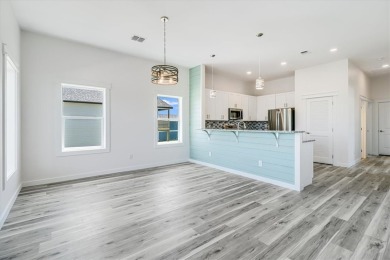 This New Construction home is located within walking distance to on Palmilla Beach Golf Club in Texas - for sale on GolfHomes.com, golf home, golf lot