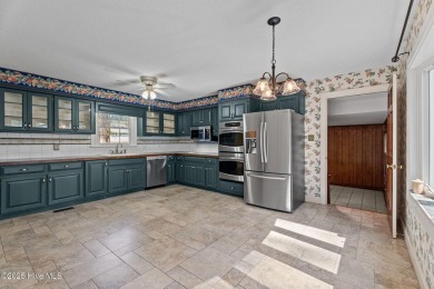 Located on the golf course at Wilson Country Club, this on Wilson Country Club in North Carolina - for sale on GolfHomes.com, golf home, golf lot