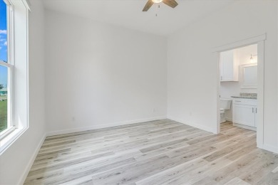 This New Construction home is located within walking distance to on Palmilla Beach Golf Club in Texas - for sale on GolfHomes.com, golf home, golf lot