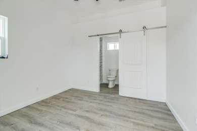 This New Construction home is located within walking distance to on Palmilla Beach Golf Club in Texas - for sale on GolfHomes.com, golf home, golf lot