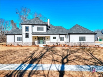 Beautiful new construction home located in the prestigious Sandy on Double Oaks Golf Club in Georgia - for sale on GolfHomes.com, golf home, golf lot