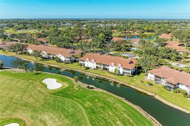 This showstopper CARRIAGE HOME is truly one of a kind, featuring on Palm Aire Country Club of Sarasota in Florida - for sale on GolfHomes.com, golf home, golf lot
