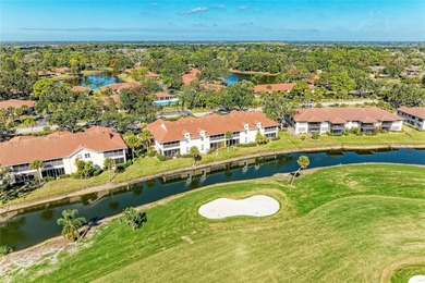 This showstopper CARRIAGE HOME is truly one of a kind, featuring on Palm Aire Country Club of Sarasota in Florida - for sale on GolfHomes.com, golf home, golf lot
