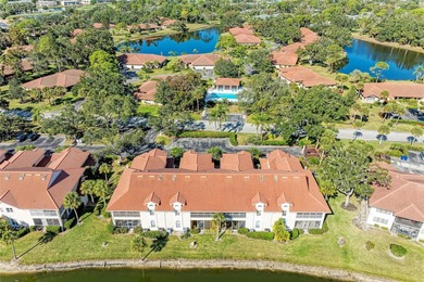 This showstopper CARRIAGE HOME is truly one of a kind, featuring on Palm Aire Country Club of Sarasota in Florida - for sale on GolfHomes.com, golf home, golf lot
