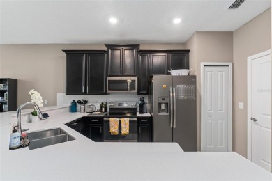 Welcome to this beautifully maintained 2-bedroom, 2-bathroom on ChampionsGate Golf Resort in Florida - for sale on GolfHomes.com, golf home, golf lot