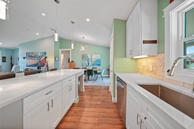 Constructed in 2021, this MODERN-STYLE residence in Rotonda West on Rotonda Golf and Country Club The Palms Course in Florida - for sale on GolfHomes.com, golf home, golf lot