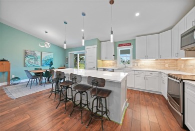 Constructed in 2021, this MODERN-STYLE residence in Rotonda West on Rotonda Golf and Country Club The Palms Course in Florida - for sale on GolfHomes.com, golf home, golf lot
