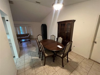 Motivated Seller,   This Beautiful 4 bed, 2 bath, 2-car garage on Port Charlotte Golf Club in Florida - for sale on GolfHomes.com, golf home, golf lot