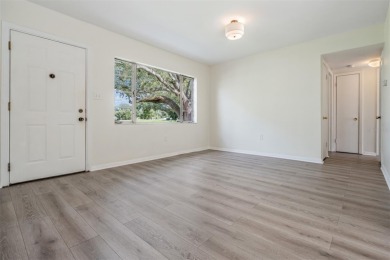 Charming Mid-Century Home with Golf Course Views! Nestled among on Babe Zaharias Golf Course in Florida - for sale on GolfHomes.com, golf home, golf lot