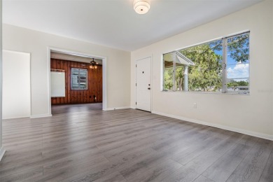 Charming Mid-Century Home with Golf Course Views! Nestled among on Babe Zaharias Golf Course in Florida - for sale on GolfHomes.com, golf home, golf lot