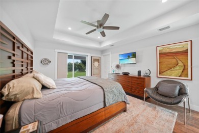 Constructed in 2021, this MODERN-STYLE residence in Rotonda West on Rotonda Golf and Country Club The Palms Course in Florida - for sale on GolfHomes.com, golf home, golf lot