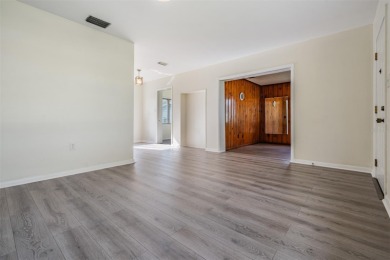 Charming Mid-Century Home with Golf Course Views! Nestled among on Babe Zaharias Golf Course in Florida - for sale on GolfHomes.com, golf home, golf lot