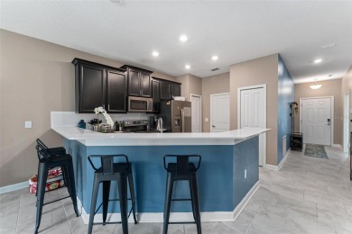 Welcome to this beautifully maintained 2-bedroom, 2-bathroom on ChampionsGate Golf Resort in Florida - for sale on GolfHomes.com, golf home, golf lot