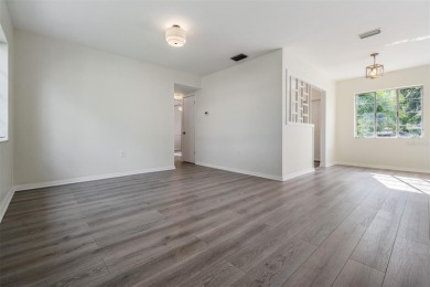 Charming Mid-Century Home with Golf Course Views! Nestled among on Babe Zaharias Golf Course in Florida - for sale on GolfHomes.com, golf home, golf lot