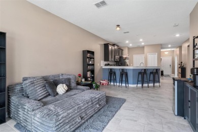Welcome to this beautifully maintained 2-bedroom, 2-bathroom on ChampionsGate Golf Resort in Florida - for sale on GolfHomes.com, golf home, golf lot