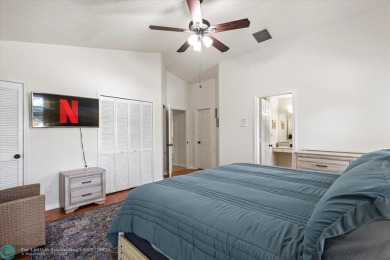 You'll love coming home to this hidden gem on Sailfish Sands on Martin County Golf Course in Florida - for sale on GolfHomes.com, golf home, golf lot