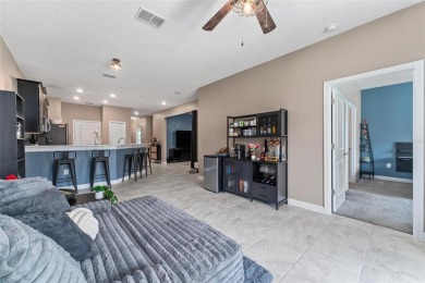 Welcome to this beautifully maintained 2-bedroom, 2-bathroom on ChampionsGate Golf Resort in Florida - for sale on GolfHomes.com, golf home, golf lot