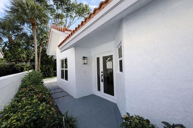 Fully renovated 3-bedroom, 3-bathroom residence in the highly on Broken Sound Golf and Club  in Florida - for sale on GolfHomes.com, golf home, golf lot