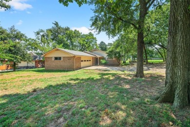 Perched on the tee box of the 14th hole of the beautiful Lake on Lake Kiowa Golf Course in Texas - for sale on GolfHomes.com, golf home, golf lot