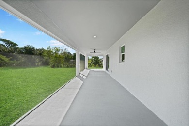Constructed in 2021, this MODERN-STYLE residence in Rotonda West on Rotonda Golf and Country Club The Palms Course in Florida - for sale on GolfHomes.com, golf home, golf lot