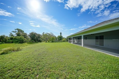Constructed in 2021, this MODERN-STYLE residence in Rotonda West on Rotonda Golf and Country Club The Palms Course in Florida - for sale on GolfHomes.com, golf home, golf lot