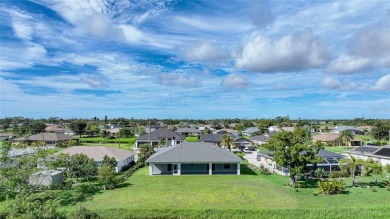 Constructed in 2021, this MODERN-STYLE residence in Rotonda West on Rotonda Golf and Country Club The Palms Course in Florida - for sale on GolfHomes.com, golf home, golf lot