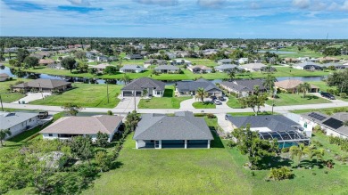 Constructed in 2021, this MODERN-STYLE residence in Rotonda West on Rotonda Golf and Country Club The Palms Course in Florida - for sale on GolfHomes.com, golf home, golf lot