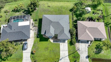Constructed in 2021, this MODERN-STYLE residence in Rotonda West on Rotonda Golf and Country Club The Palms Course in Florida - for sale on GolfHomes.com, golf home, golf lot