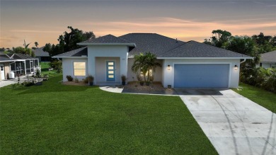 Constructed in 2021, this MODERN-STYLE residence in Rotonda West on Rotonda Golf and Country Club The Palms Course in Florida - for sale on GolfHomes.com, golf home, golf lot