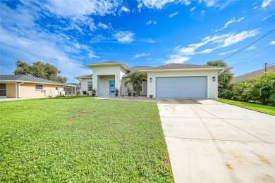 Constructed in 2021, this MODERN-STYLE residence in Rotonda West on Rotonda Golf and Country Club The Palms Course in Florida - for sale on GolfHomes.com, golf home, golf lot