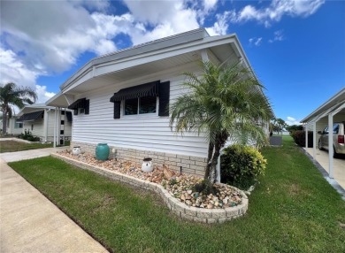 UNDENIABLY BEAUTIFUL HOME LOCATED DIRECTLY ON THE GOLF COURSE on Fairway Village Golf Course in Florida - for sale on GolfHomes.com, golf home, golf lot