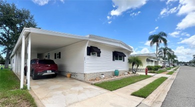 UNDENIABLY BEAUTIFUL HOME LOCATED DIRECTLY ON THE GOLF COURSE on Fairway Village Golf Course in Florida - for sale on GolfHomes.com, golf home, golf lot