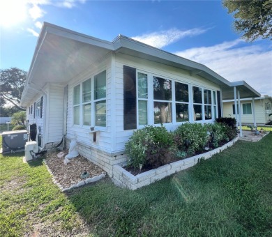 UNDENIABLY BEAUTIFUL HOME LOCATED DIRECTLY ON THE GOLF COURSE on Fairway Village Golf Course in Florida - for sale on GolfHomes.com, golf home, golf lot