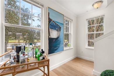 Wake up to peaceful golf course and water views in this on Celebration Golf Club in Florida - for sale on GolfHomes.com, golf home, golf lot