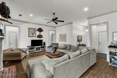 This 4 bedroom, 2 bath home is full of charm and space for the on Lake Caroline Golf Club in Mississippi - for sale on GolfHomes.com, golf home, golf lot