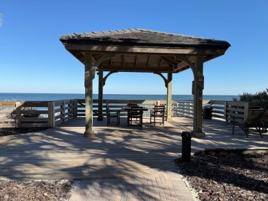 Your dream is living on the first floor of a high end oceanfront on Hammock Dunes Club in Florida - for sale on GolfHomes.com, golf home, golf lot