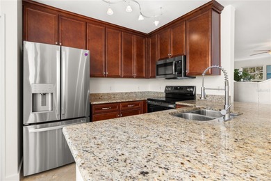 Wake up to peaceful golf course and water views in this on Celebration Golf Club in Florida - for sale on GolfHomes.com, golf home, golf lot